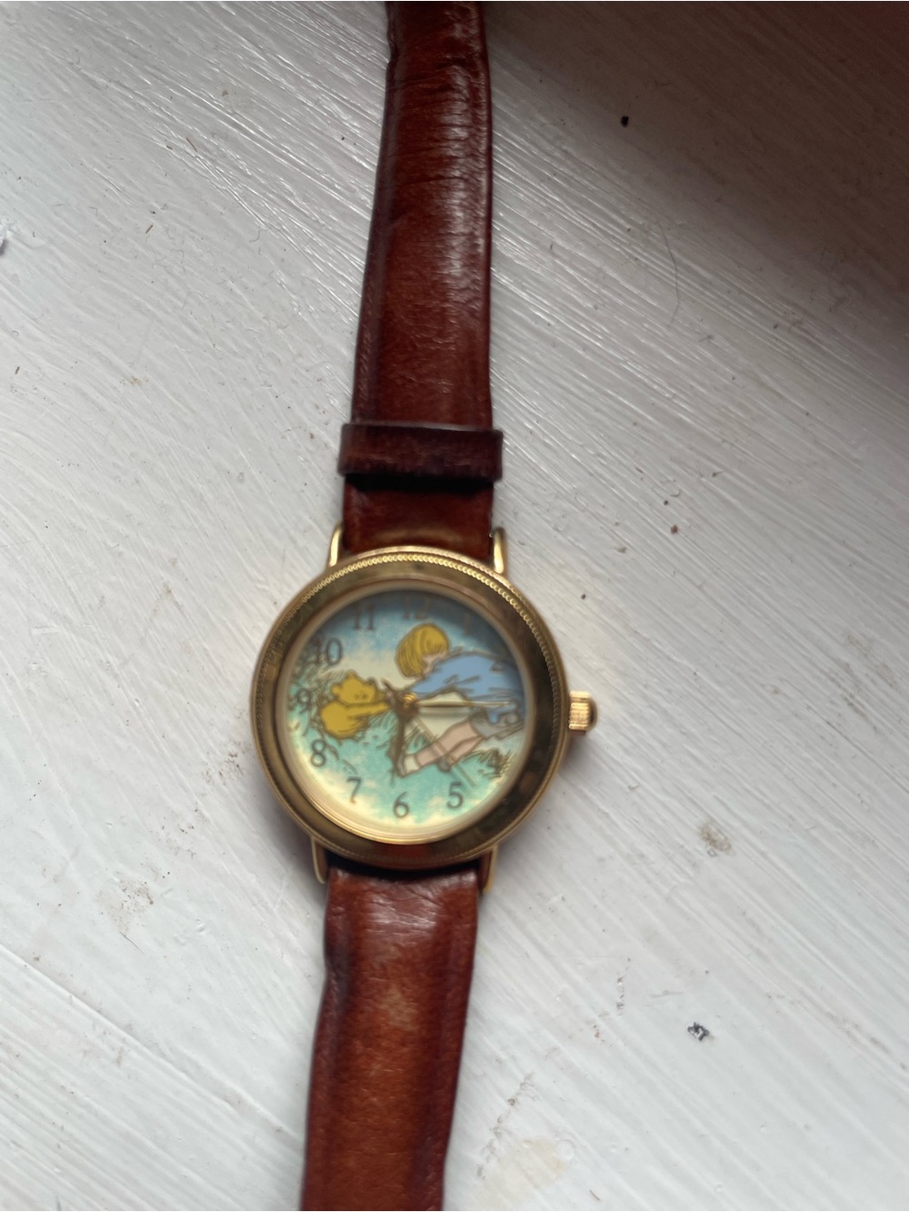Winnie the Pooh vintage watch. Gold with brown leather band.